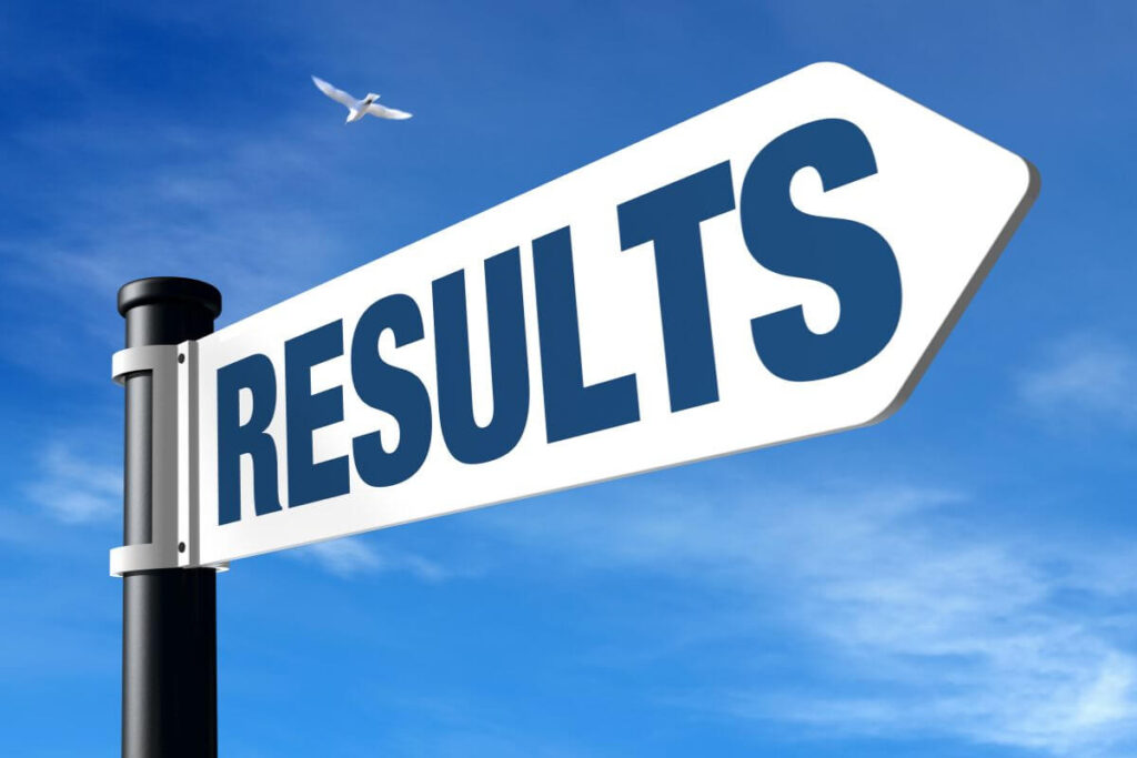 Directional sign with the word “RESULTS” symbolising achievement, progress, and goal-focused learning.