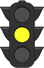 Yellow traffic light symbolising caution when using ChatGPT for maths homework and the need for responsible AI use.